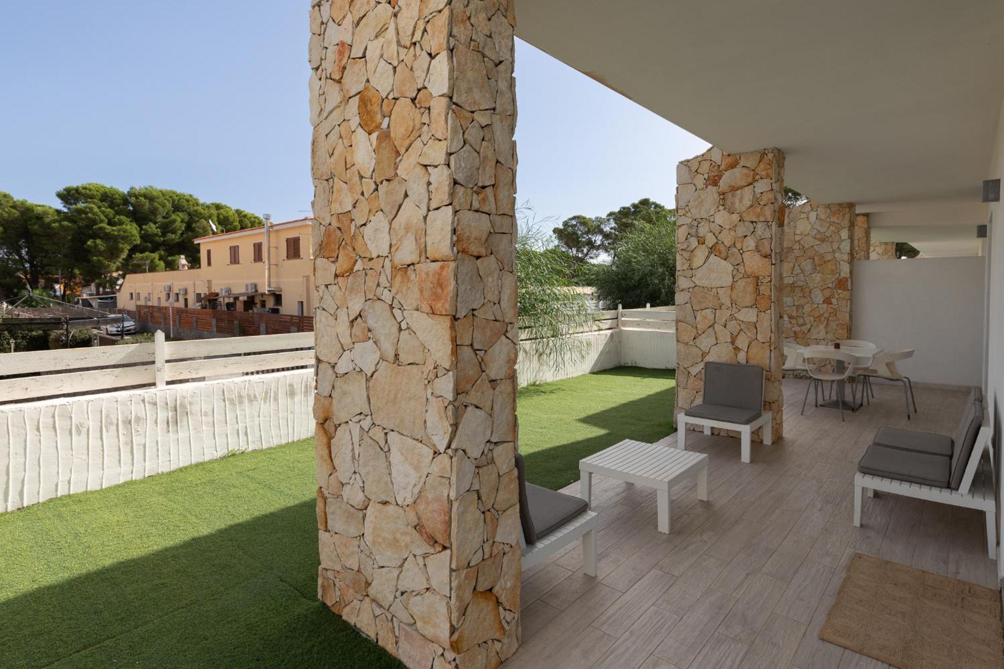 Case Vacanze "Bianco Mare" Porto Pino Exterior photo
